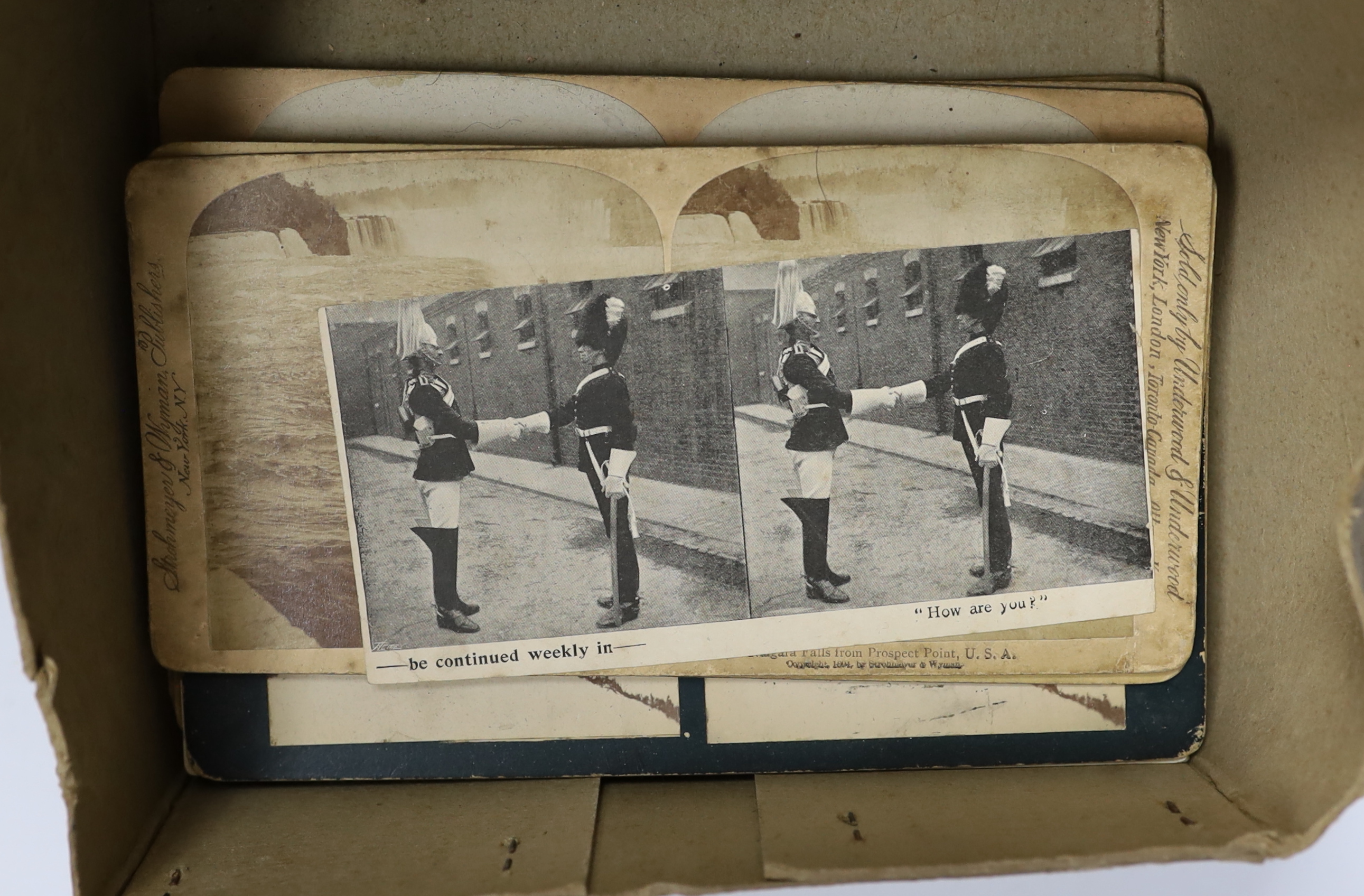 Two stereoscopic viewers and slides